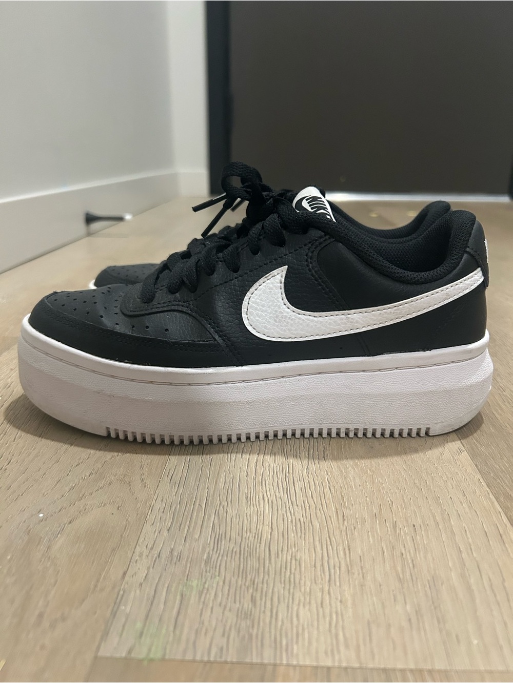 Nike Women’s Black and White Platform Sneakers